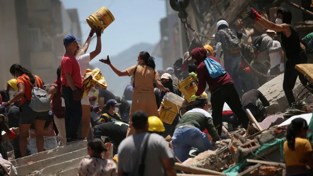 Rescuers scramble for survivors with 180 dead in Colombia earthquake